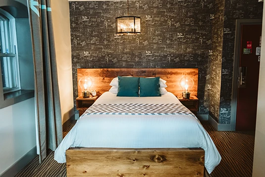 Room 6: E=MC Squared, queen bed